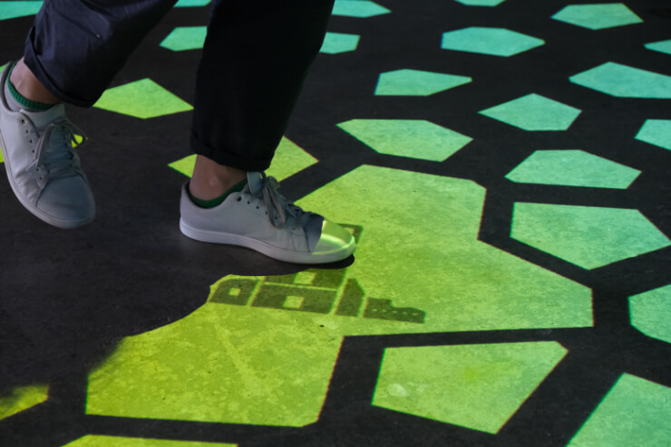 Celebrating biodiversity for Biomuseo Panama when entering museum final colorful gallery visitors interact with floor