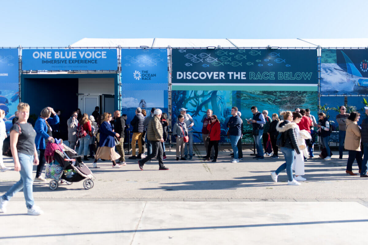 One Blue Voice people outside immersive experience building