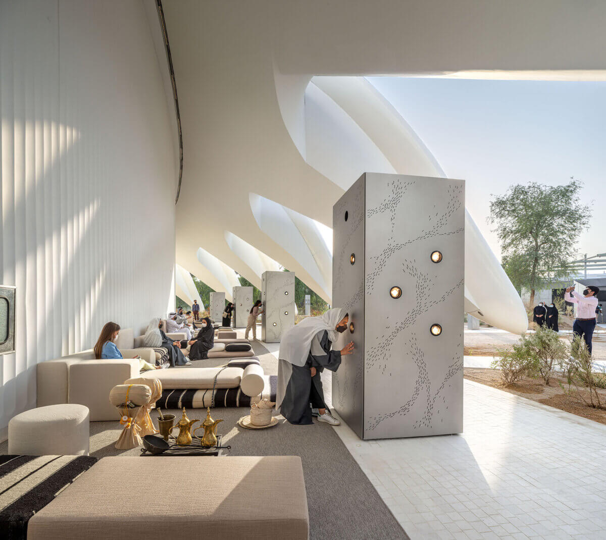 UAE Pavilion at World Expo Dubai 2020 lady looking multi-sensory guest experience Emirati culture, values and history
