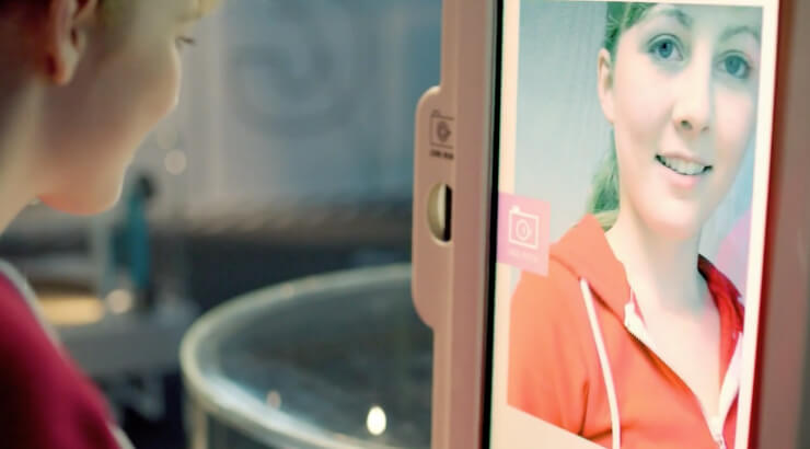 Chrome Web Lab: Making the Internet physical visitor taking photo for sketchbots to create sand drawing exhibition