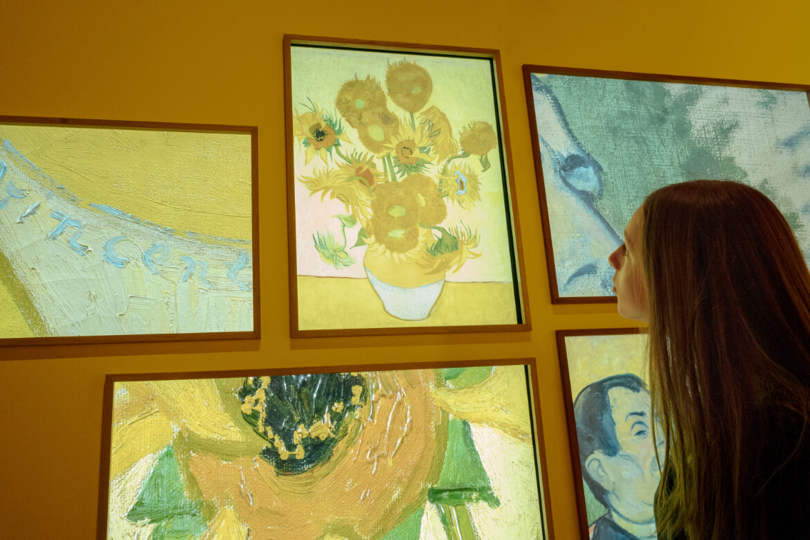 Van Gogh Dreams for Van Gogh Museum Amsterdam Living with Gauguin visitor viewing yellow house room immersive design installation