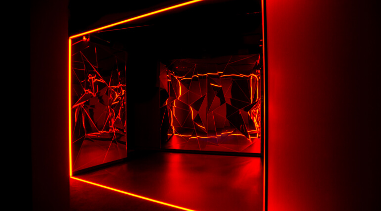 Van Gogh Dreams for Van Gogh Museum Amsterdam Dream Falls Apart red room capturing Van Gogh's inner turmoil design immersive installation