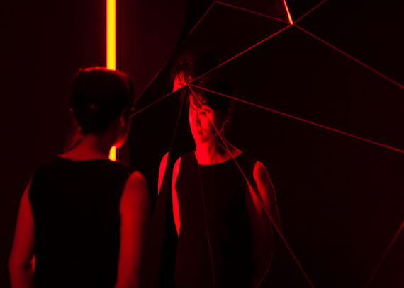 Van Gogh Dreams for Van Gogh Museum Amsterdam Dream Falls Apart visitor entering red room capturing Van Gogh's inner turmoil design immersive installation