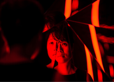 Van Gogh Dreams for Van Gogh Museum Amsterdam Dream Falls Apart visitor entering red room capturing Van Gogh's inner turmoil design immersive installation