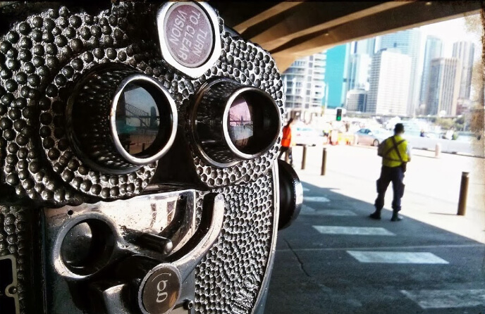 Close-up of binoculars highlighting strategic communication design