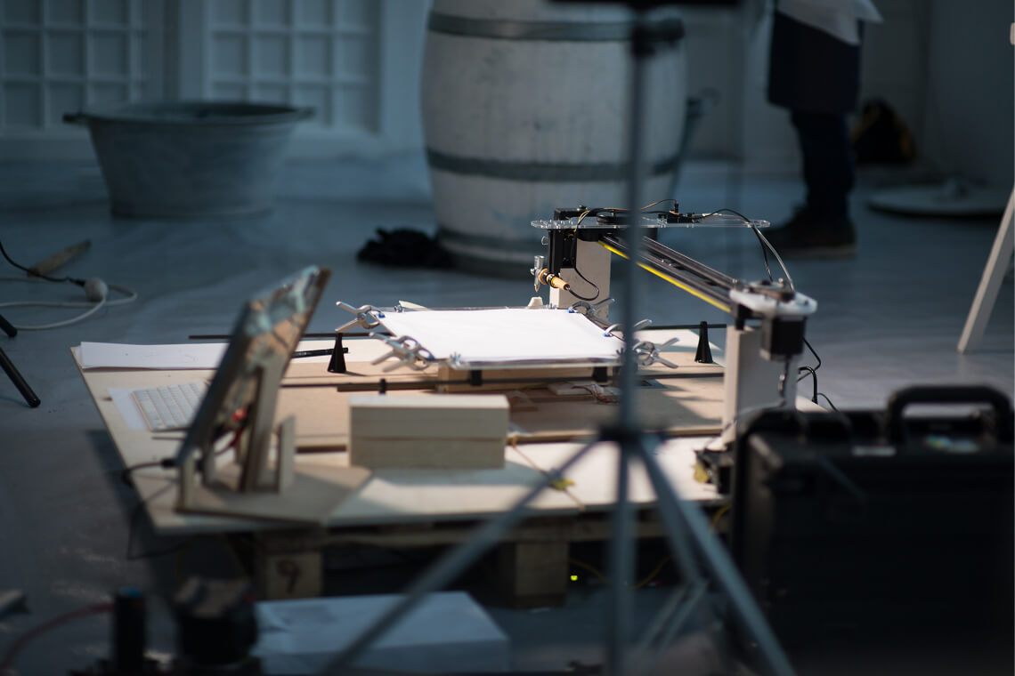 Beeswax printing robot creating speculative future star charts textiles