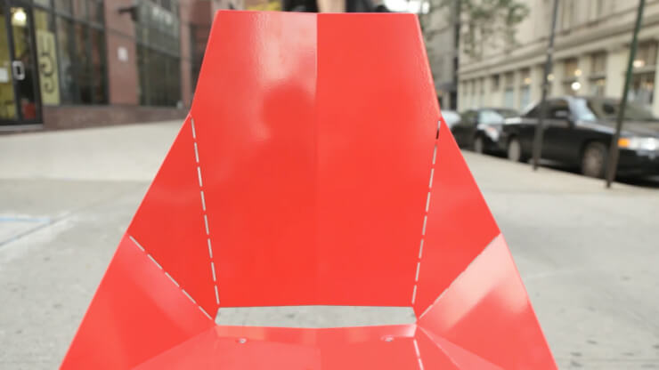 Artwork featuring Real Good chairs in an urban area