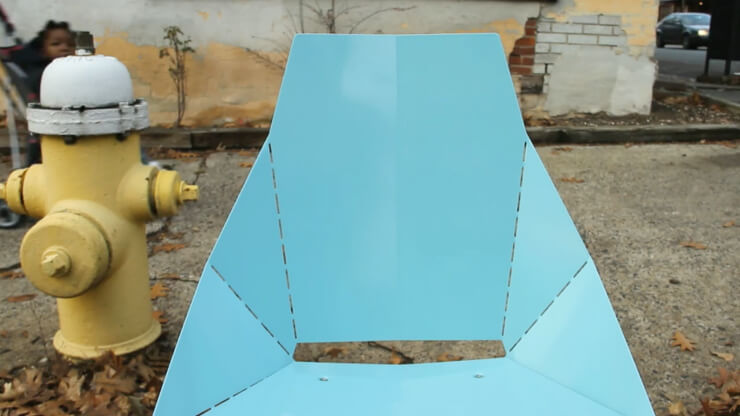 Artwork featuring Real Good chairs in an urban area