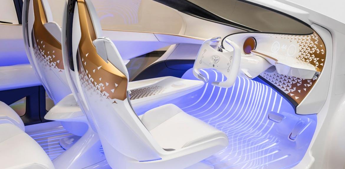 Toyota futuristic car design with AI consumer electronics at CES