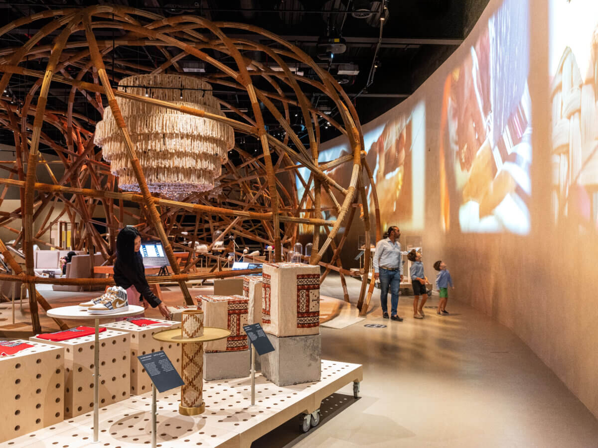 Wall projecting the video of Emirati crafts techniques